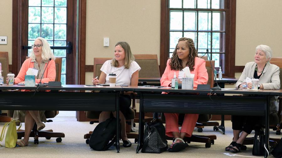 people sitting in meeting