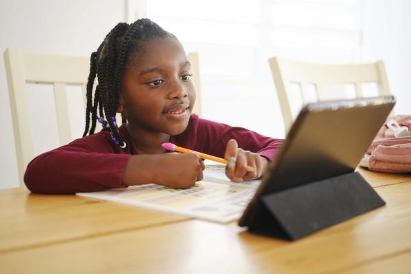 student at home computer