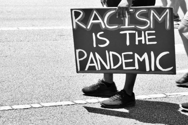 racism poster sign