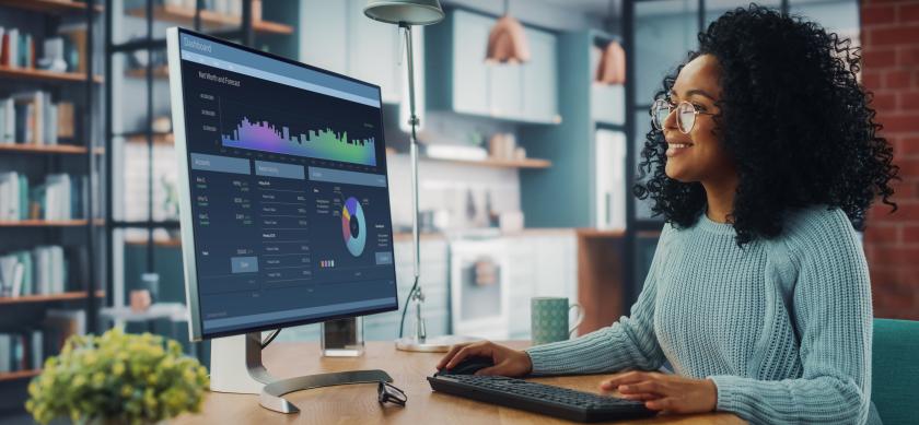 woman working at desk computer
