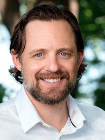 headshot of adam nation