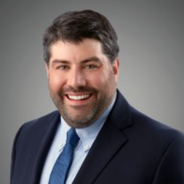 headshot of ben kroeck in suit 