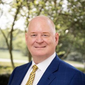 headshot of tim mathile